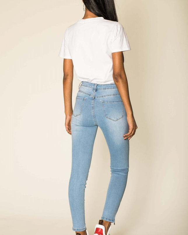 Wholesale light blue zipped jeans