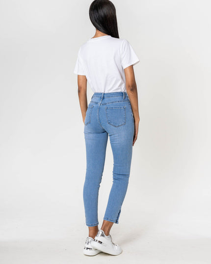 Wholesale light blue Jeans with buttons at the bottom of the leg